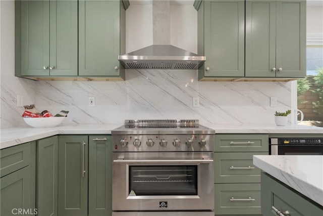 22 Sage Cyn, Pomona, CA 91766 - kitchen featuring green cabinetry, high end range, wall chimney exhaust hood, and decorative backsplash