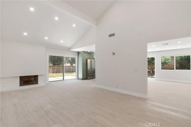 22 Sage Cyn, Pomona, CA 91766 - unfurnished living room with recessed lighting, high vaulted ceiling, and light wood-style floors