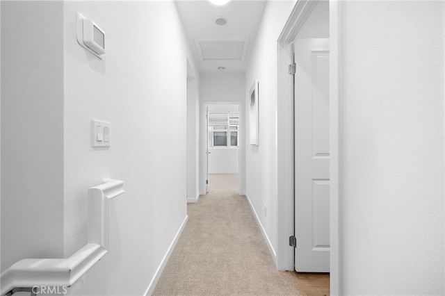 944 N Divino Privado Unit 57, Ontario, CA 91764 - hallway with light colored carpet and baseboards