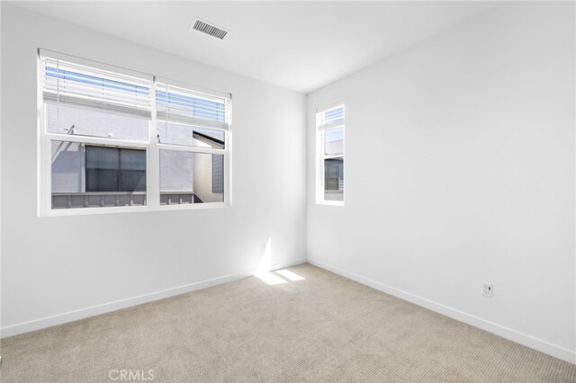 944 N Divino Privado Unit 57, Ontario, CA 91764 - carpeted spare room featuring baseboards