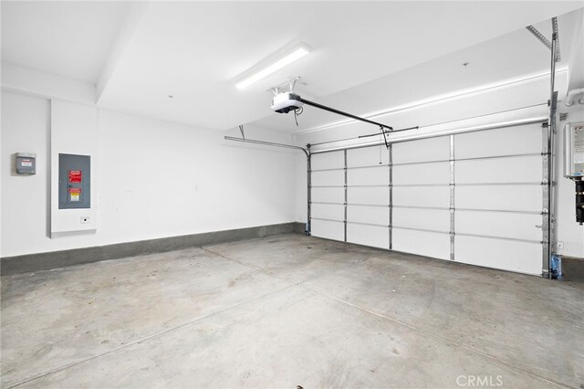 944 N Divino Privado Unit 57, Ontario, CA 91764 - garage featuring a garage door opener and electric panel