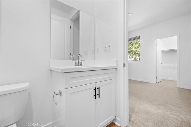 944 N Divino Privado Unit 57, Ontario, CA 91764 - bathroom with vanity and baseboards