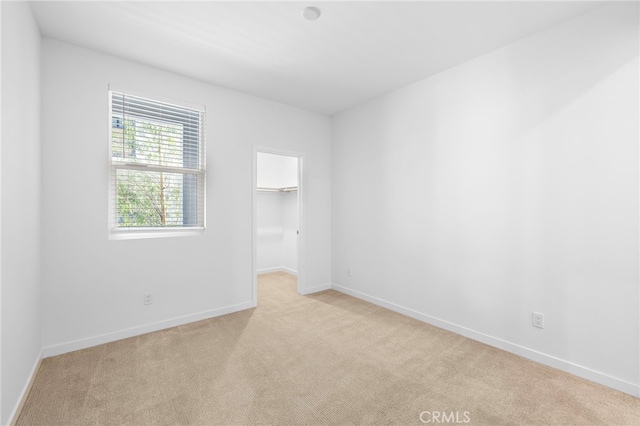 944 N Divino Privado Unit 57, Ontario, CA 91764 - spare room with light colored carpet and baseboards