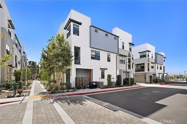 944 N Divino Privado Unit 57, Ontario, CA 91764 - view of building exterior with a residential view