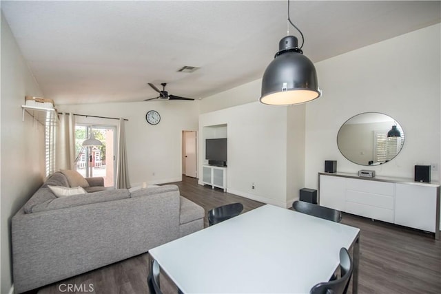 783 Pointe Vista Ln, Corona, CA 92881 - dining area featuring dark wood finished floors, vaulted ceiling, and a ceiling fan