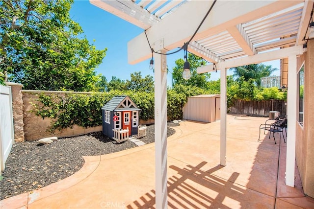 783 Pointe Vista Ln, Corona, CA 92881 - fenced backyard featuring a patio area, a shed, and a pergola