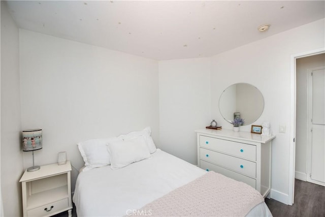 783 Pointe Vista Ln, Corona, CA 92881 - bedroom with dark wood-type flooring and baseboards