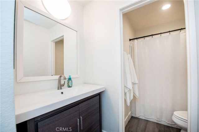 783 Pointe Vista Ln, Corona, CA 92881 - full bathroom with vanity, wood finished floors, and a shower with shower curtain