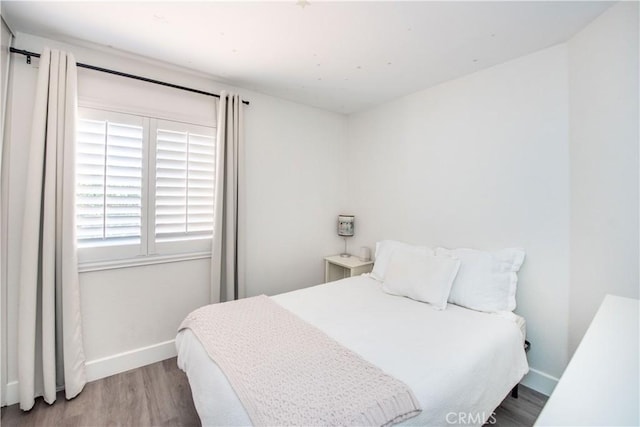 783 Pointe Vista Ln, Corona, CA 92881 - bedroom with wood finished floors and baseboards