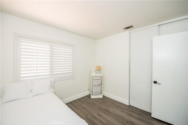 783 Pointe Vista Ln, Corona, CA 92881 - unfurnished bedroom featuring wood finished floors and a closet