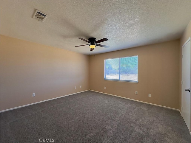 22241 Cholena Rd, Apple Valley, CA 92307 - spare room with a ceiling fan, dark colored carpet, and a textured ceiling