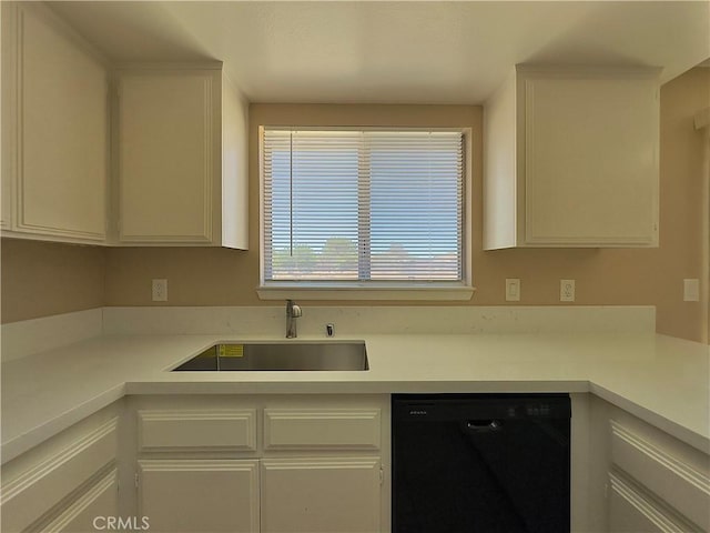 22241 Cholena Rd, Apple Valley, CA 92307 - kitchen with black dishwasher, white cabinets, and light countertops