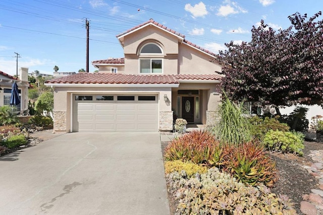 9481 Deanly St, Lakeside, CA 92040 - mediterranean / spanish-style house featuring stone siding, concrete driveway, stucco siding, and a tiled roof