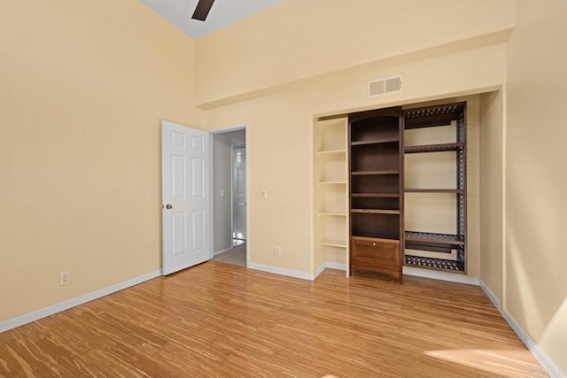 9481 Deanly St, Lakeside, CA 92040 - unfurnished bedroom featuring wood finished floors, a ceiling fan, and a closet