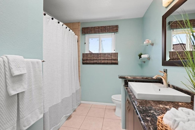 9481 Deanly St, Lakeside, CA 92040 - bathroom with healthy amount of natural light, vanity, tile patterned flooring, and a shower with shower curtain