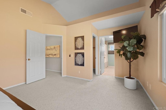 9481 Deanly St, Lakeside, CA 92040 - unfurnished bedroom featuring light carpet, vaulted ceiling, and ensuite bath