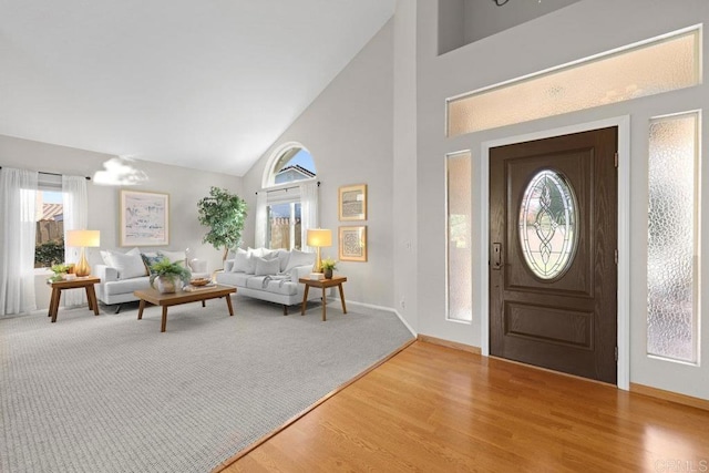 9481 Deanly St, Lakeside, CA 92040 - entrance foyer with high vaulted ceiling, healthy amount of natural light, and light wood-type flooring