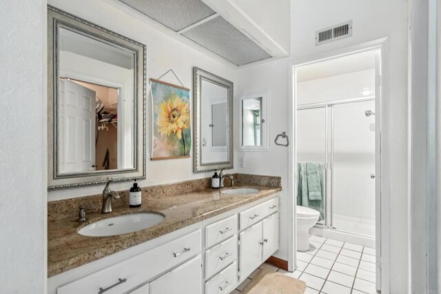 3428 Cameo Dr # 49, Oceanside, CA 92056 - bathroom with a stall shower, double vanity, and tile patterned floors