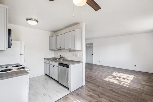 4402 Delta St Unit 23, San Diego, CA 92113 - kitchen featuring white appliances, ceiling fan, open floor plan, decorative backsplash, and light wood-style floors