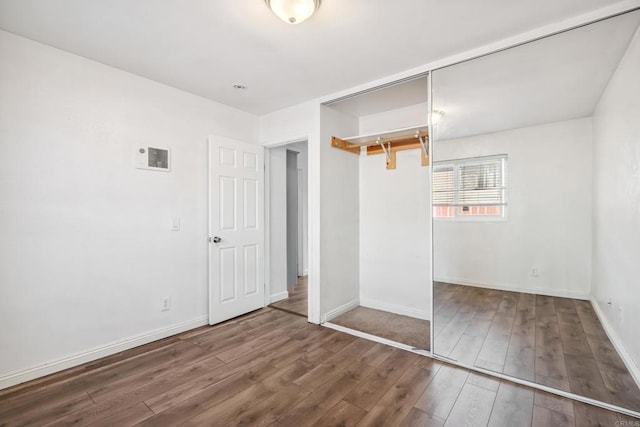 4402 Delta St Unit 23, San Diego, CA 92113 - unfurnished bedroom with a closet and wood finished floors