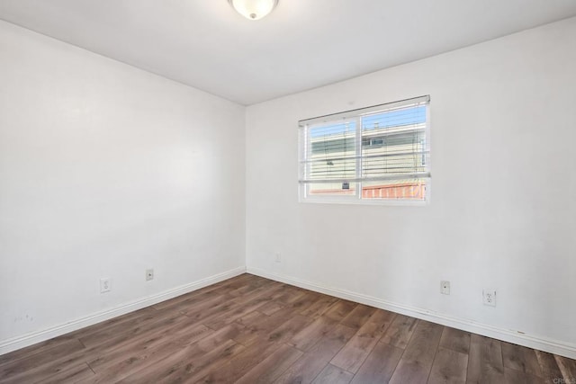 4402 Delta St Unit 23, San Diego, CA 92113 - unfurnished room featuring wood finished floors and baseboards