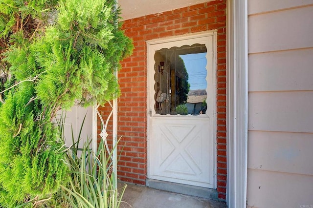 10151 Strathmore Dr, Santee, CA 92071 - view of exterior entry featuring brick siding