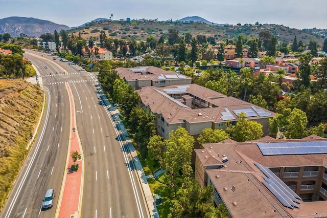7677 Mission Gorge Rd Unit 148, San Diego, CA 92120 - aerial view of residential area with a mountain backdrop and a major roadway