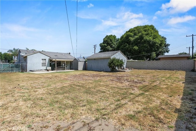 1932 S Orange Ave, West Covina, CA 91790 - fenced backyard featuring a shed and a patio