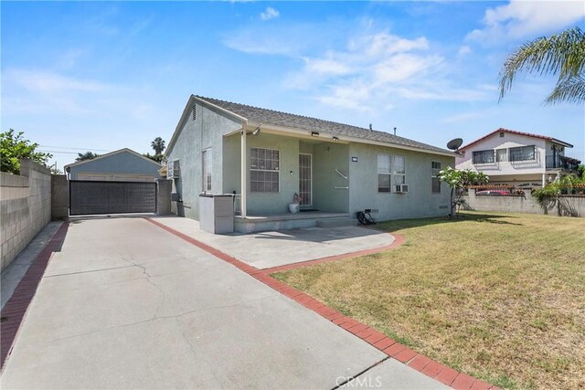 1932 S Orange Ave, West Covina, CA 91790 - view of front of home with stucco siding, a garage, and an outbuilding