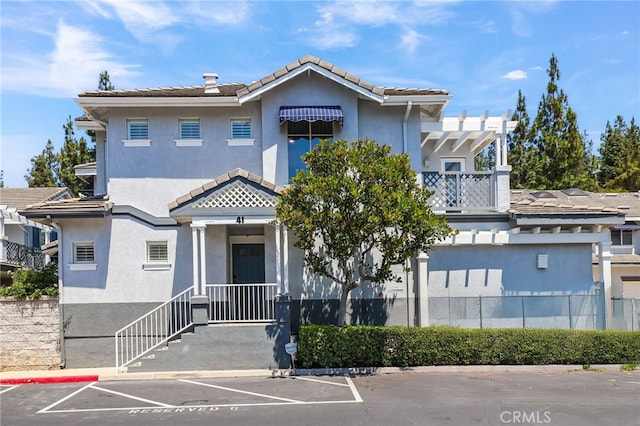 41 Breakers Ln, Aliso Viejo, CA 92656 - view of property featuring uncovered parking