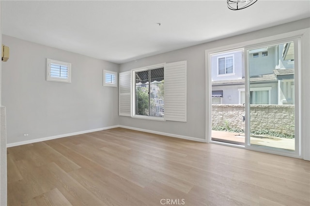 41 Breakers Ln, Aliso Viejo, CA 92656 - unfurnished living room with light wood-style flooring and baseboards