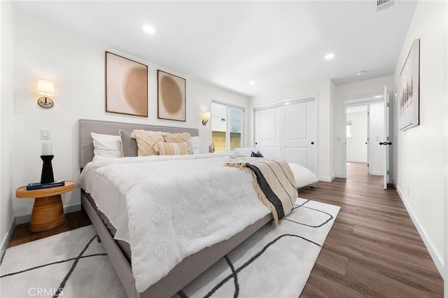 11685 Lakia Dr, Cypress, CA 90630 - bedroom featuring a closet, wood finished floors, and recessed lighting