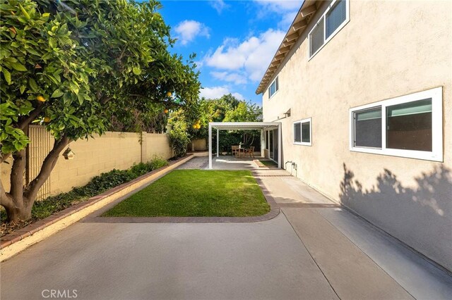 11685 Lakia Dr, Cypress, CA 90630 - fenced backyard with a patio
