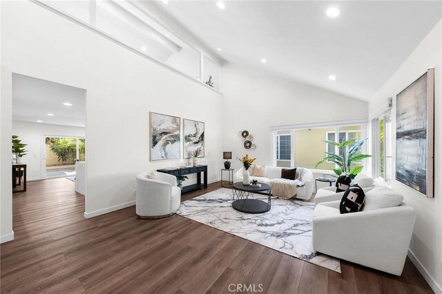 11685 Lakia Dr, Cypress, CA 90630 - living room with recessed lighting, wood finished floors, and lofted ceiling