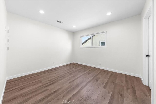 11685 Lakia Dr, Cypress, CA 90630 - unfurnished room featuring wood finished floors and recessed lighting