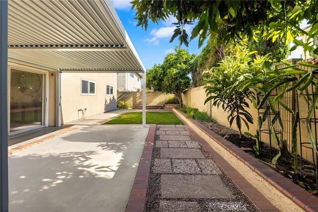 11685 Lakia Dr, Cypress, CA 90630 - fenced backyard with a patio area