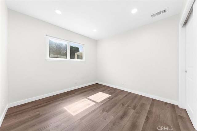 11685 Lakia Dr, Cypress, CA 90630 - unfurnished bedroom with wood finished floors, a closet, and recessed lighting