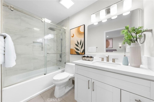 11685 Lakia Dr, Cypress, CA 90630 - bathroom featuring vanity, combined bath / shower with glass door, and tile patterned floors