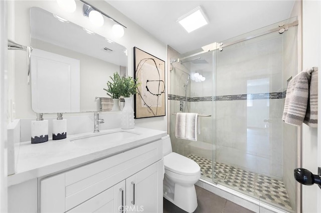 11685 Lakia Dr, Cypress, CA 90630 - full bathroom featuring vanity, a stall shower, and tile patterned flooring