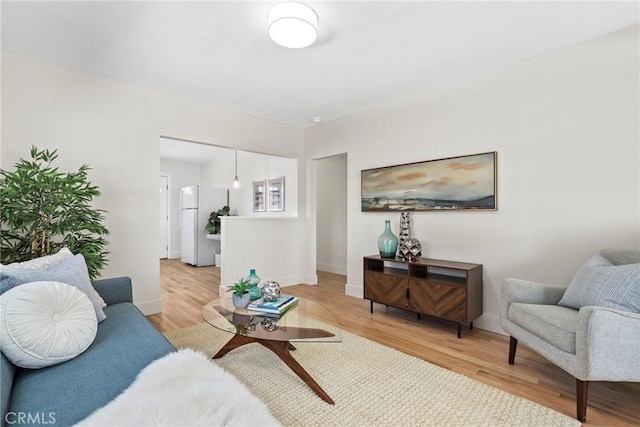 1742 253rd St, Lomita, CA 90717 - living area with light wood-type flooring and baseboards