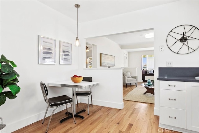 1742 253rd St, Lomita, CA 90717 - dining area with light wood finished floors and baseboards