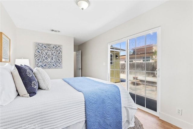 1742 253rd St, Lomita, CA 90717 - bedroom with wood finished floors and access to exterior