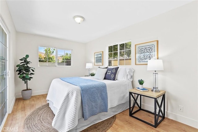 1742 253rd St, Lomita, CA 90717 - bedroom featuring multiple windows and light wood-style floors