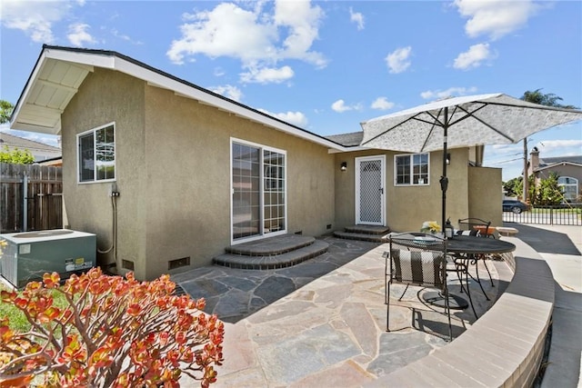 1742 253rd St, Lomita, CA 90717 - back of house with stucco siding, a patio area, and entry steps