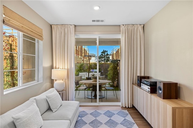 1281 Windmill Rd, Rancho Mission Viejo, CA 92694 - living area featuring healthy amount of natural light, wood finished floors, and recessed lighting