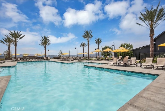 1281 Windmill Rd, Rancho Mission Viejo, CA 92694 - community pool featuring a patio