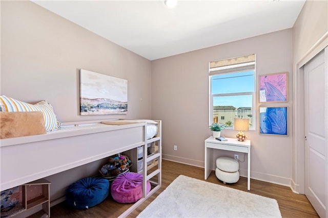 1281 Windmill Rd, Rancho Mission Viejo, CA 92694 - bedroom featuring baseboards and wood finished floors