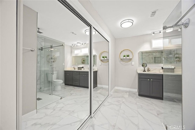 931 W Duarte Rd Unit 6, Arcadia, CA 91007 - bathroom featuring marble finish flooring, a stall shower, vanity, and plenty of natural light