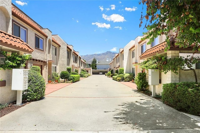 931 W Duarte Rd Unit 6, Arcadia, CA 91007 - view of concrete driveway featuring a residential view and a mountain view