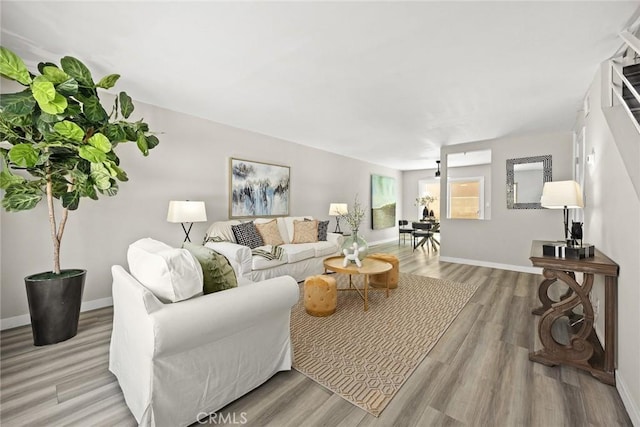 931 W Duarte Rd Unit 6, Arcadia, CA 91007 - living room with light wood-style flooring and baseboards